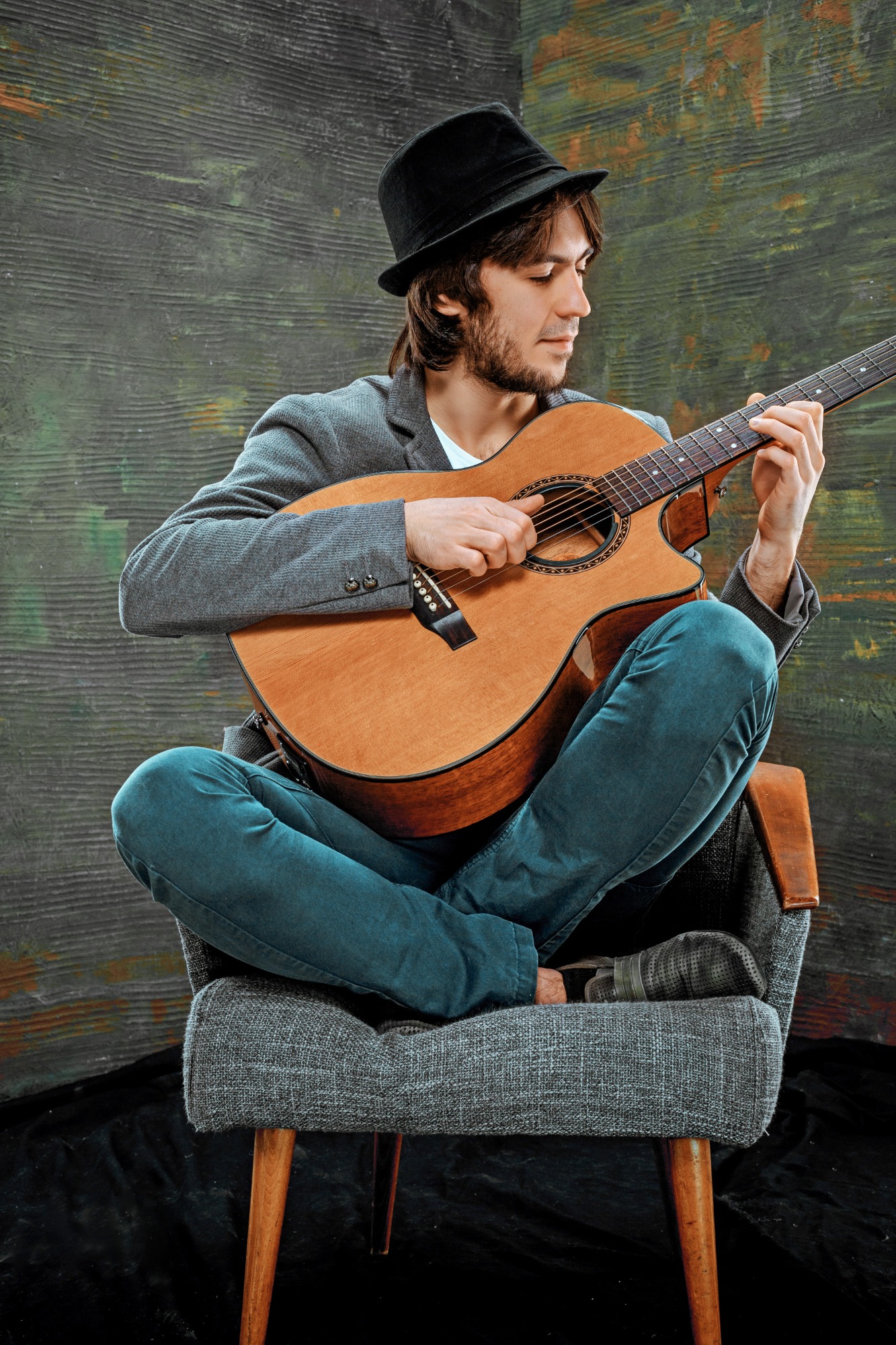 cool-guy-with-hat-playing-guitar