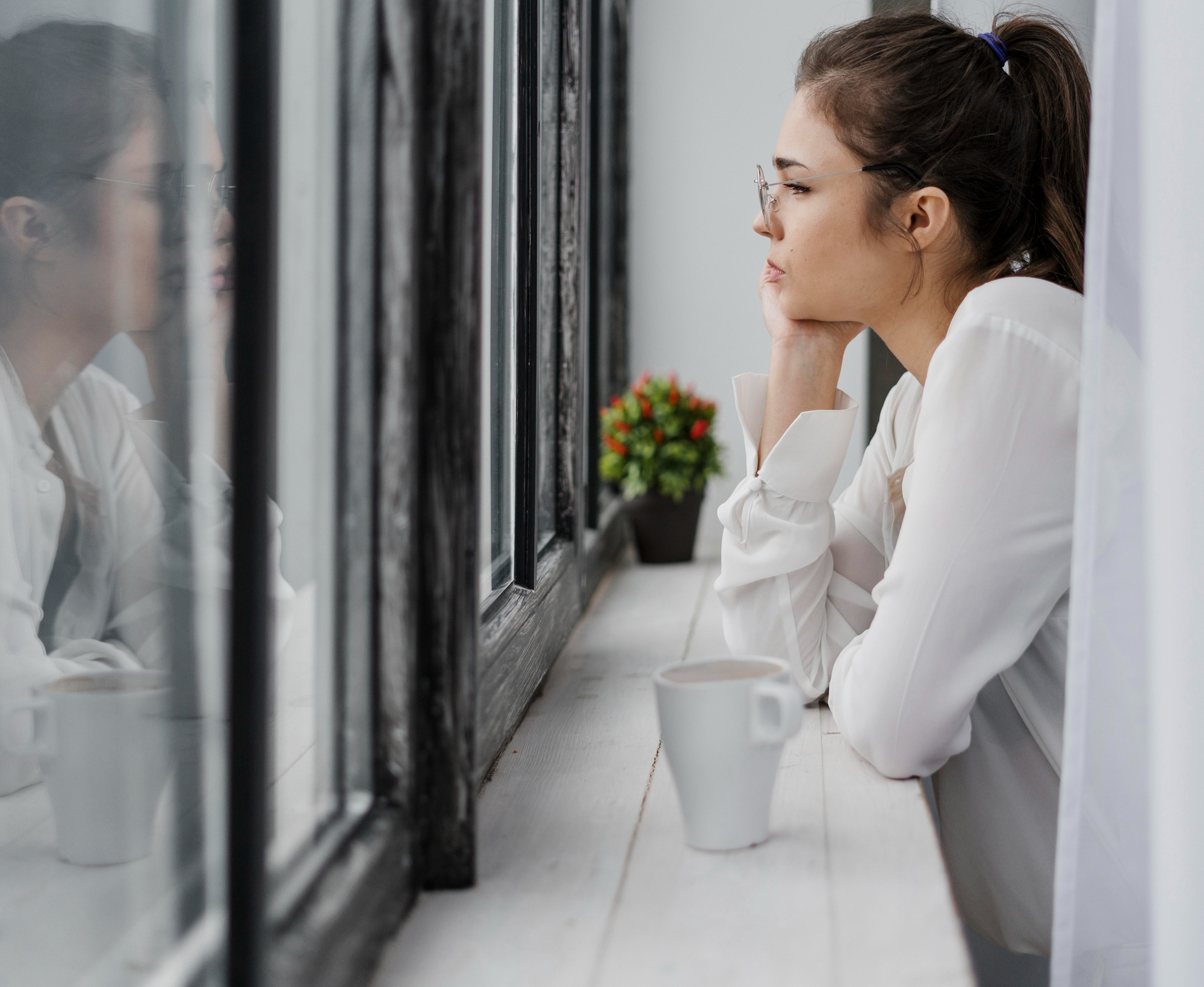 side-view-businesswoman-looking-outside