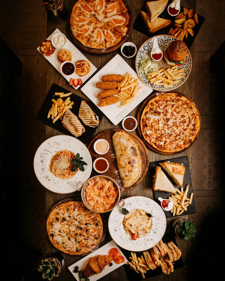 top-view-meals-tasty-yummy-different-pastries-dishes-brown-surface_140725-14554 top-view-meals-tasty-yummy-different-pastries-dishes-brown-surface_140725-14554